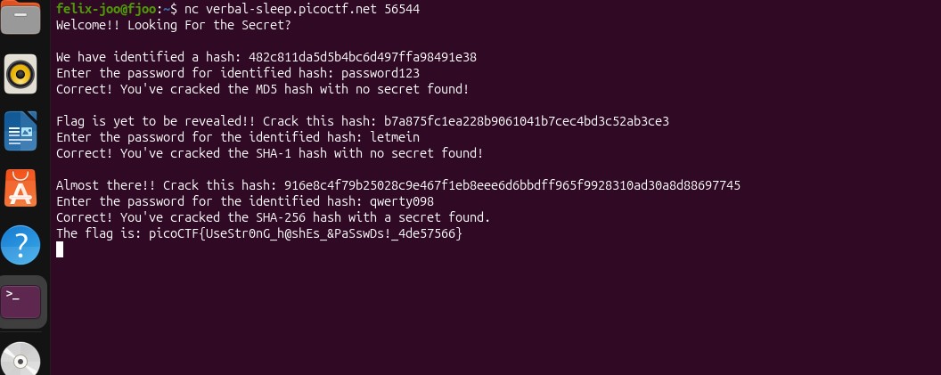 Terminal showing all three hashes cracked and the flag revealed